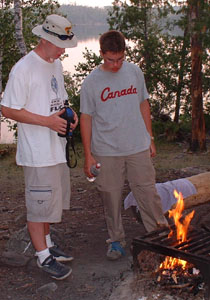 Ryan and Brendan observe a well constructed small campfire